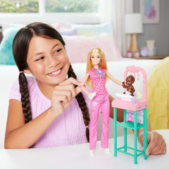 Barbie Baby Doctor examination table with stars overhead for imaginative care scenes