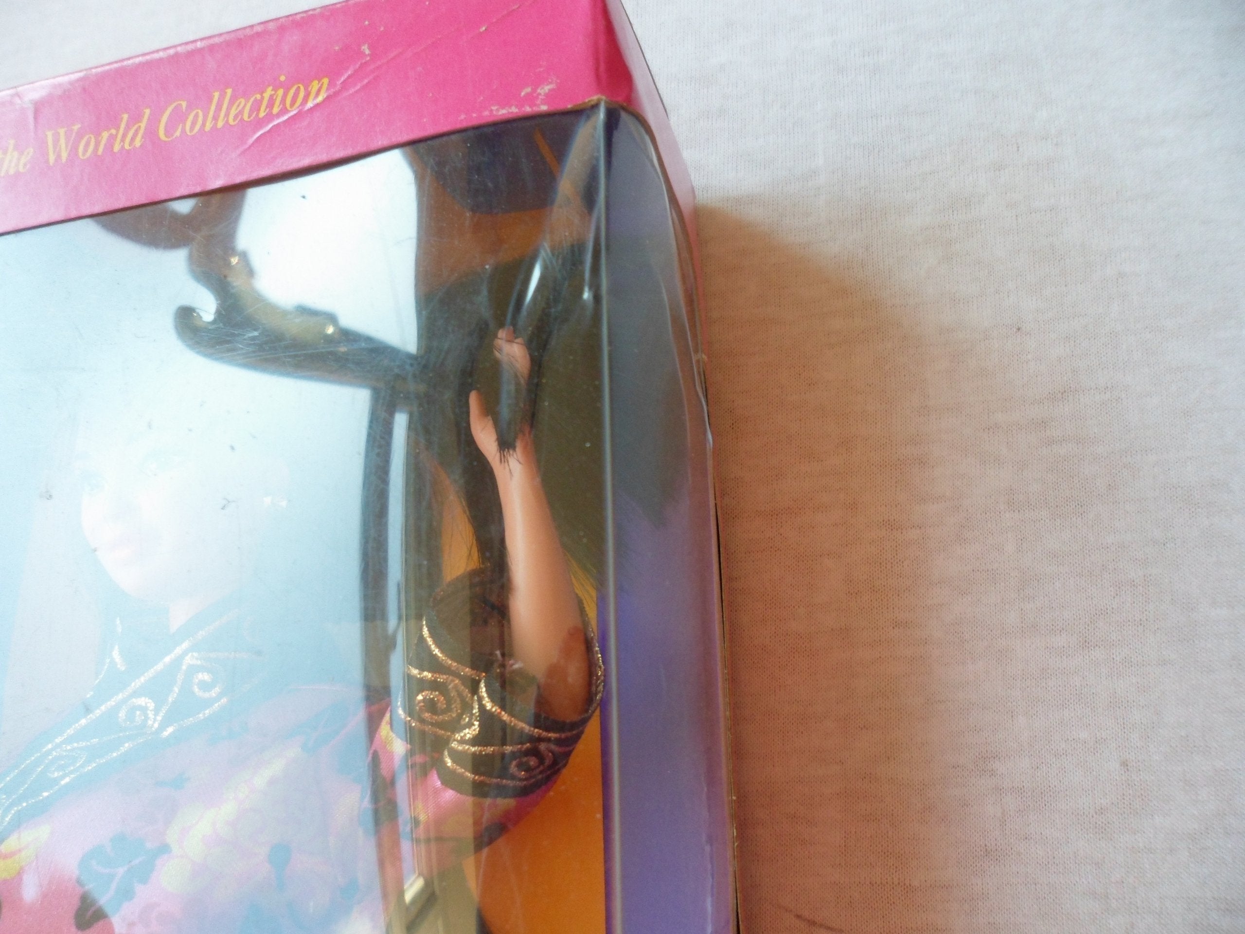 Back-of-box story for Barbie Special Edition Chinese Barbie enhances imagination.