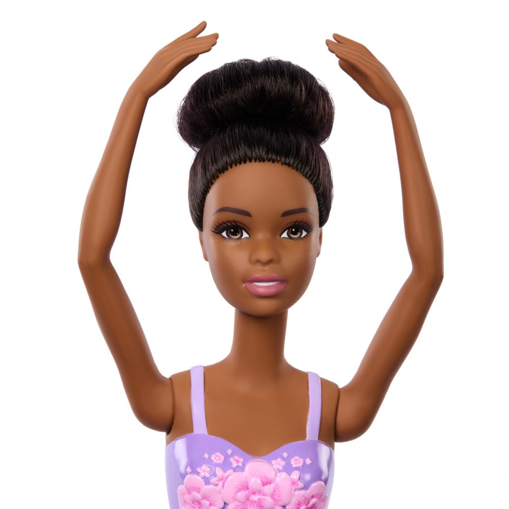 Barbie ballerina doll in en pointe shoes sparks graceful movement and pretend stage performances.