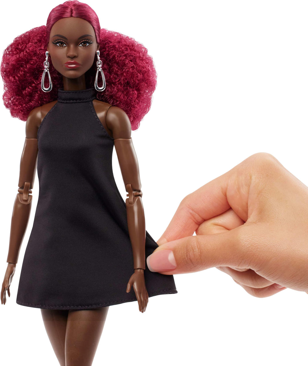 Barbie Basics Model 03 in stylish boots for poised poses