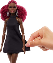 Barbie Basics Model 03 in stylish boots for poised poses