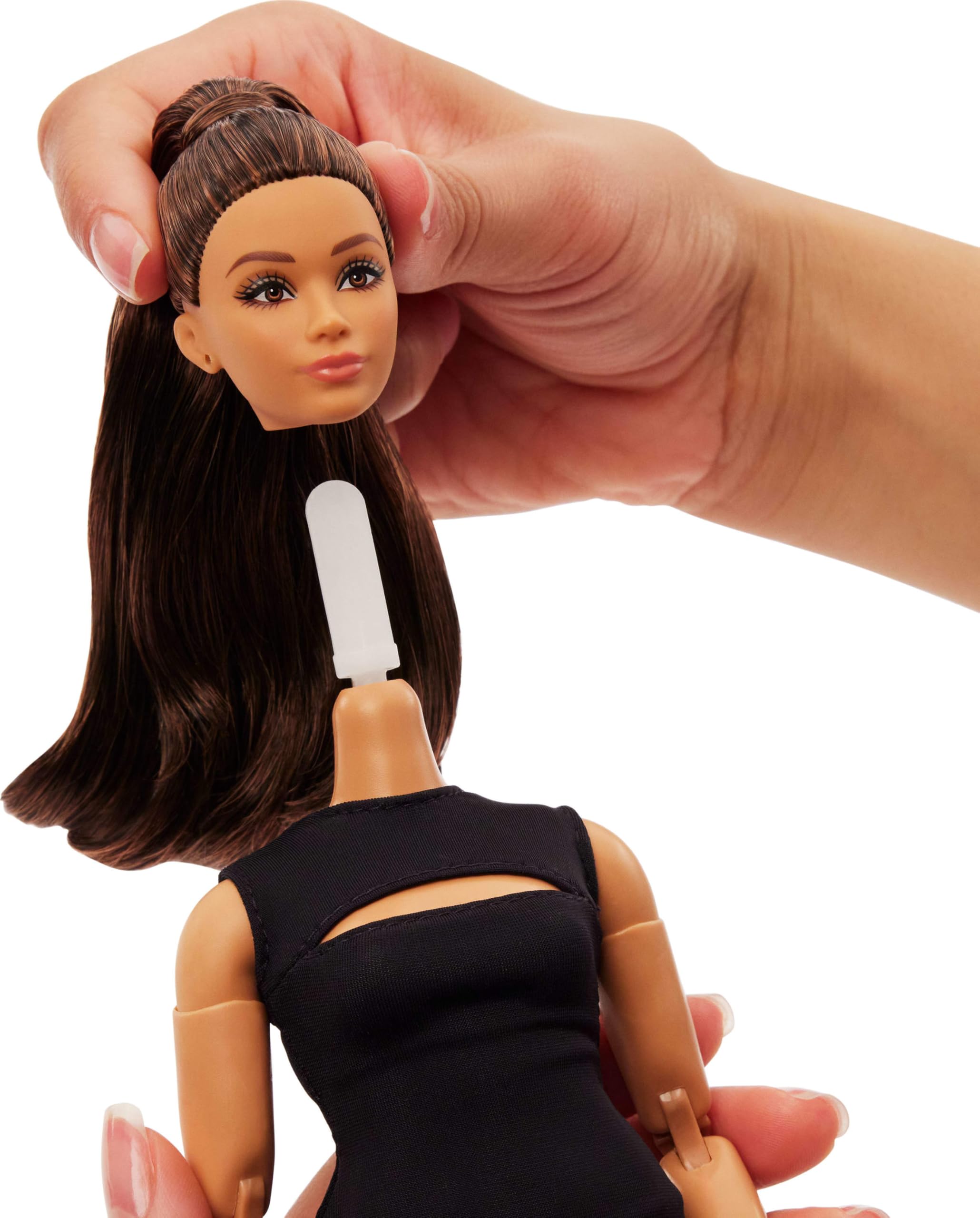 Barbie Basics Model 05 swappable doll head for customizable looks.
