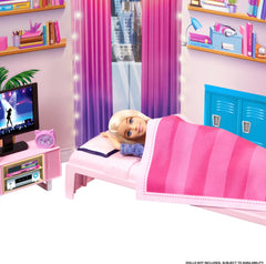 Barbie dorm ottoman doubles as footrest and extra surface.
