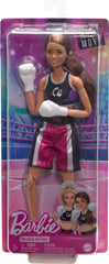 Barbie boxer doll pink shoes enhance colorful, immersive boxing play.
