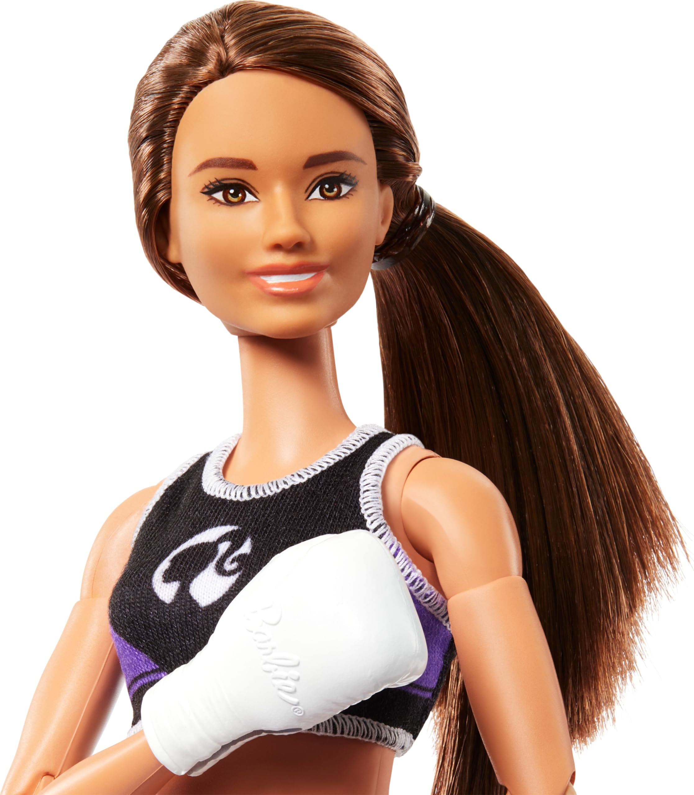 Barbie boxer doll with removable uniform for mix-and-match play outfits.