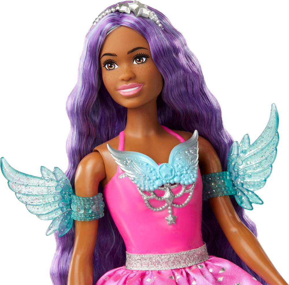 Barbie Brooklyn pet butterfly inviting gentle imaginative companionship.