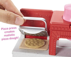 Barbie Careers cheese shredder adds toppings with a turning crank.