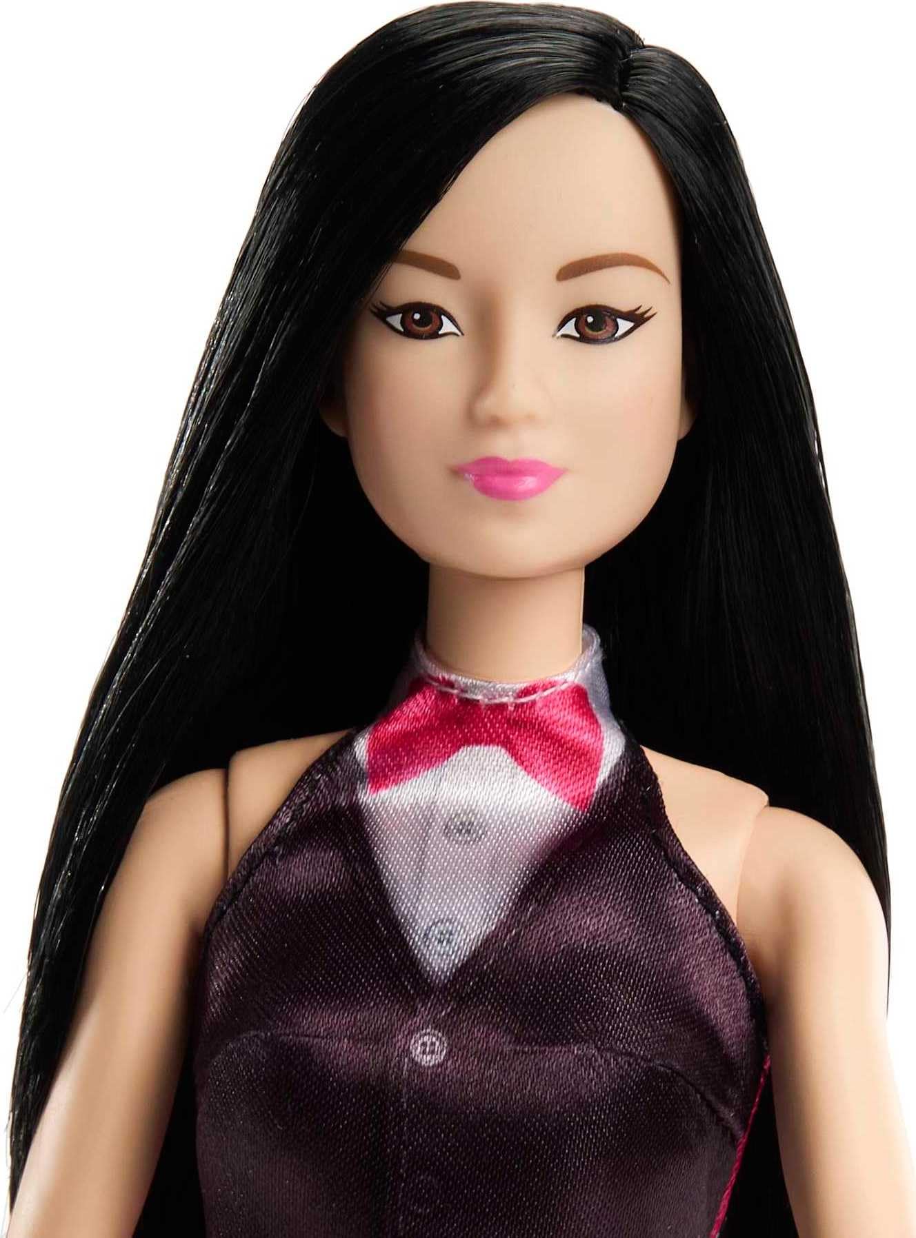 Barbie Careers doll in elegant dress and tuxedo vest for dress-up play.