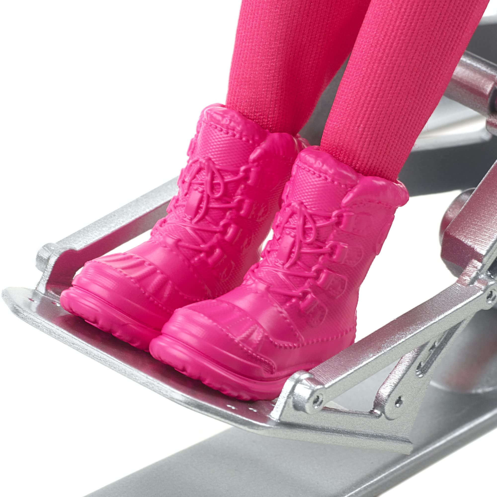Barbie Careers outriggers skis, authentic equipment for storytelling on snowy adventures.