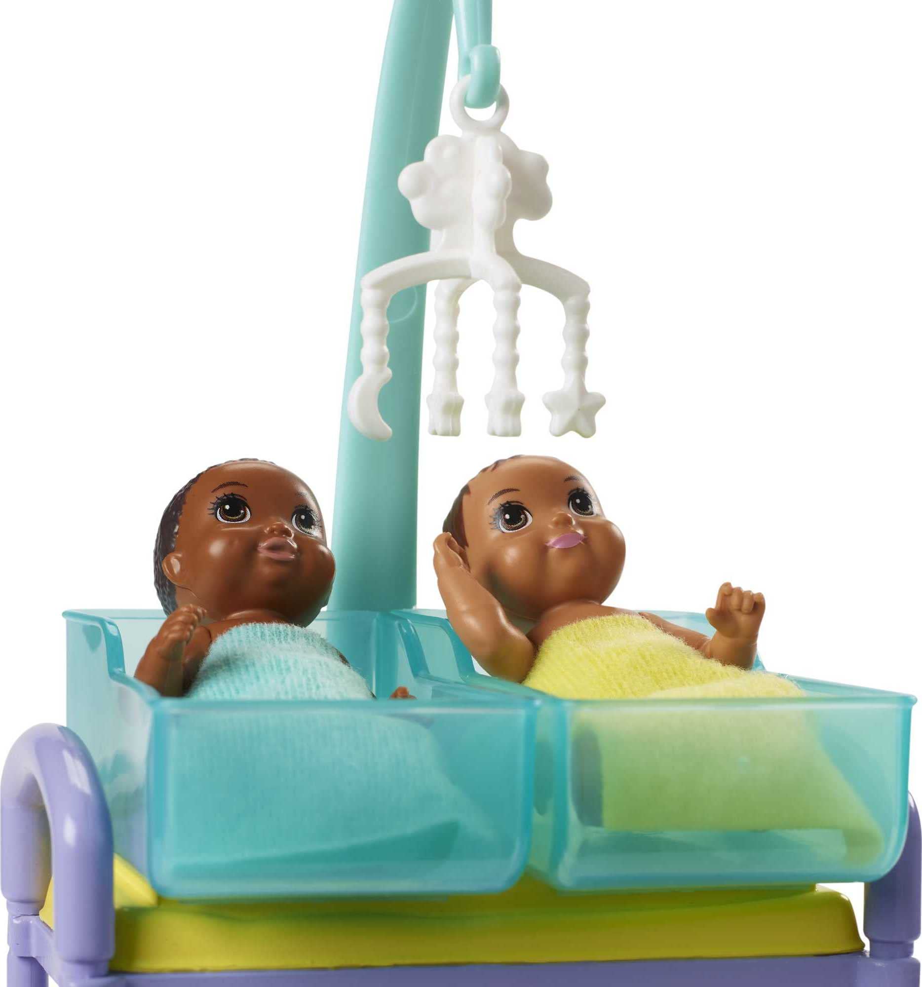 Barbie Careers Playset two baby dolls wrapped in blankets for caretaking stories.