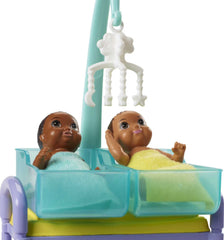Barbie Careers Playset two baby dolls wrapped in blankets for caretaking stories.