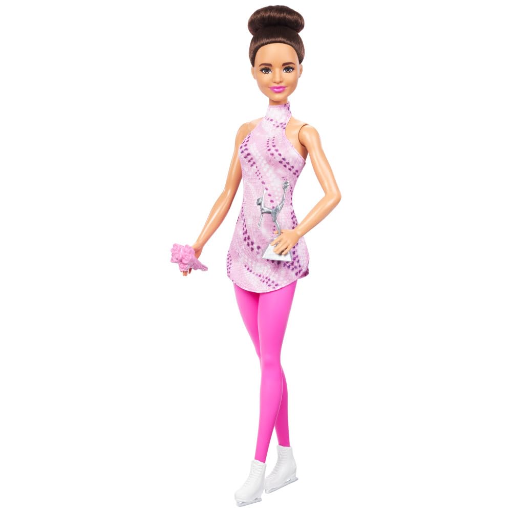 Barbie Careers removable pink top adds outfit versatility for play.