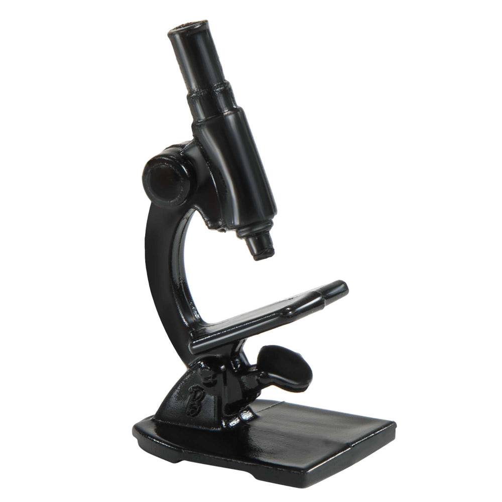 Barbie Careers Scientist doll and microscope support hands-on pretend research.