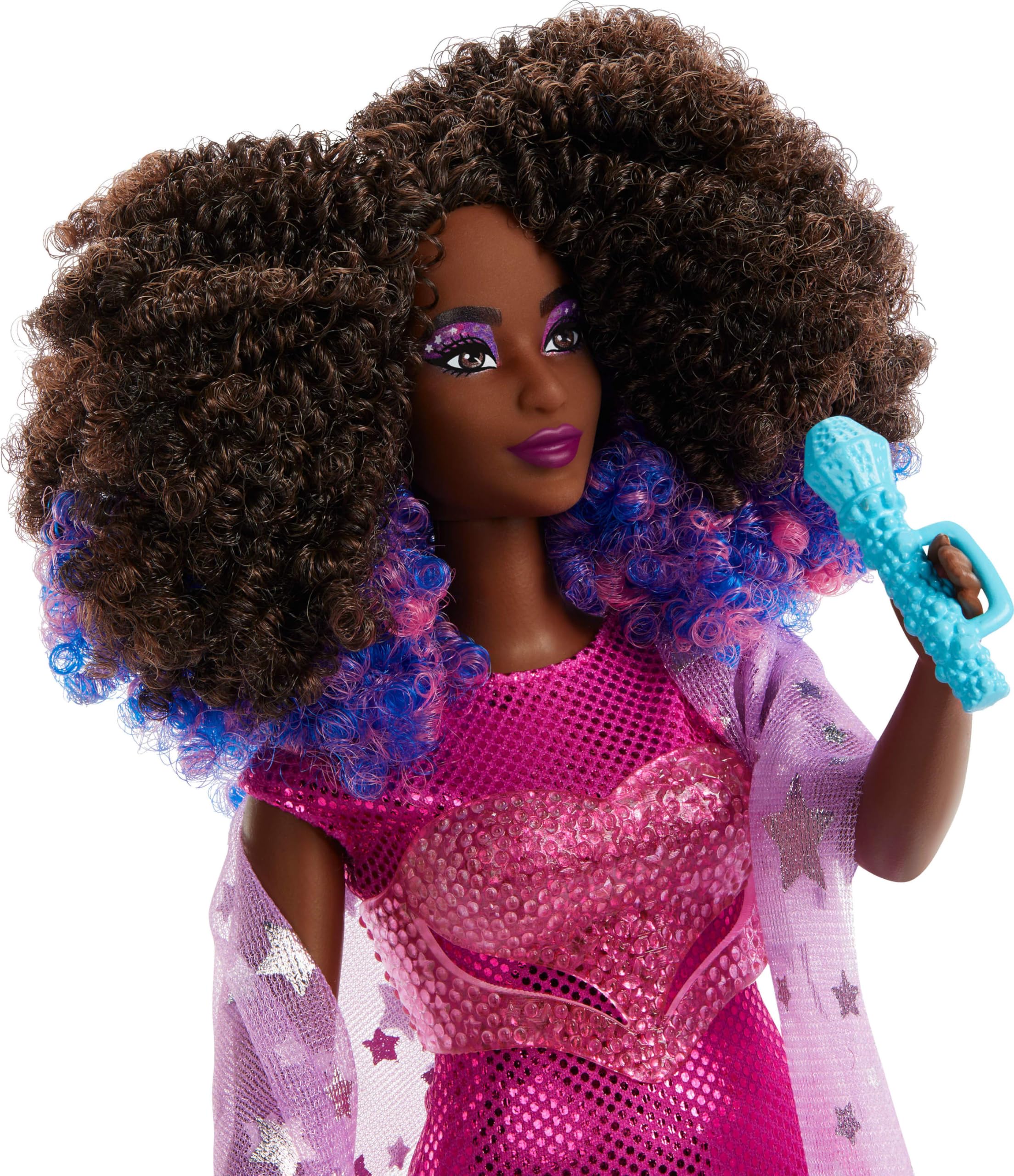 Barbie Tour Manager doll in a black jacket and pink pants ready for planning