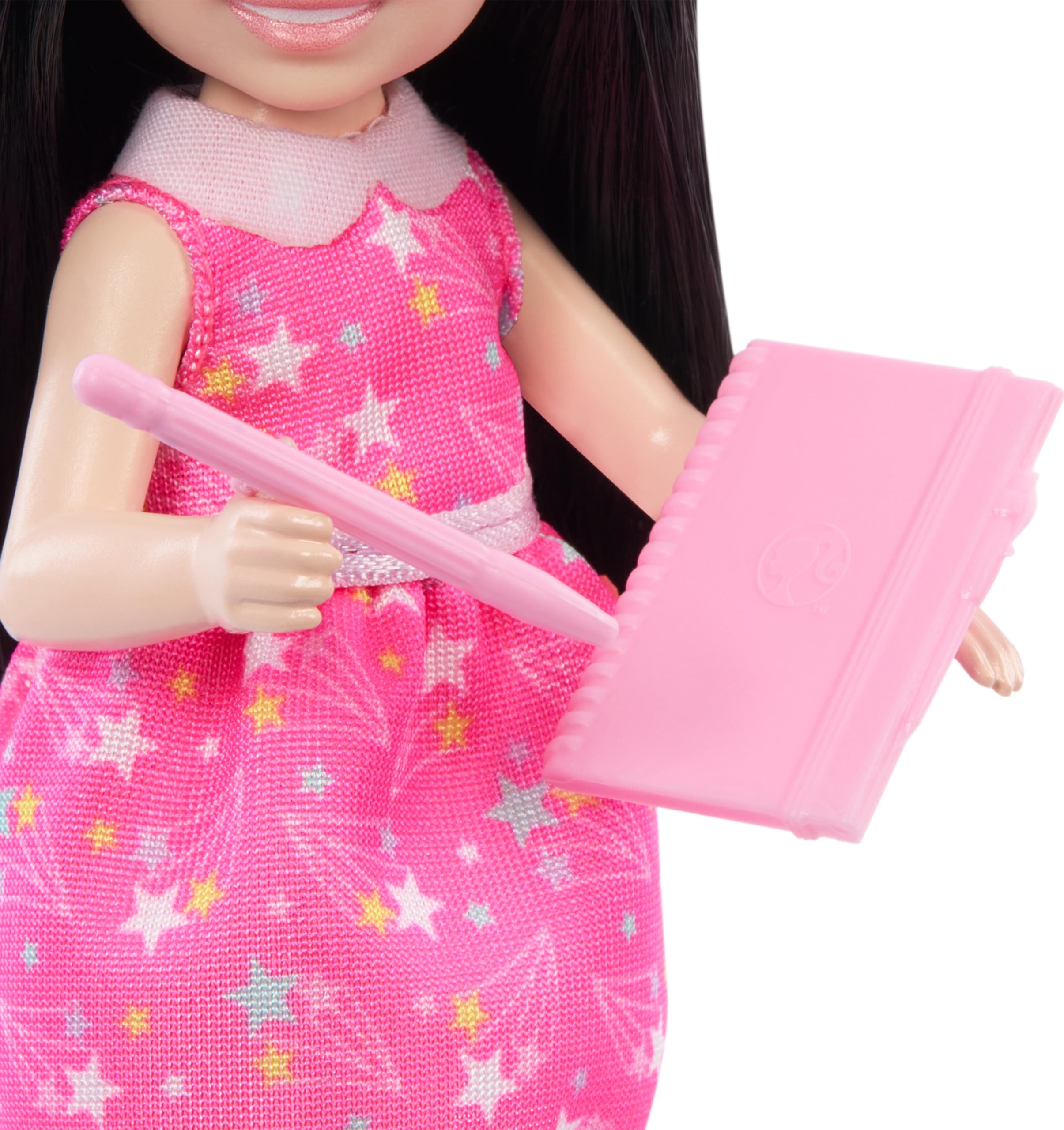 Barbie Chelsea Can Be Astronomer wearing star dress for creative play.
