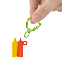 Barbie Chelsea charm keychain lets kids clip the doll to backpacks