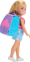 Barbie Chelsea cupcake baking backpack opens for imaginative kitchen play.