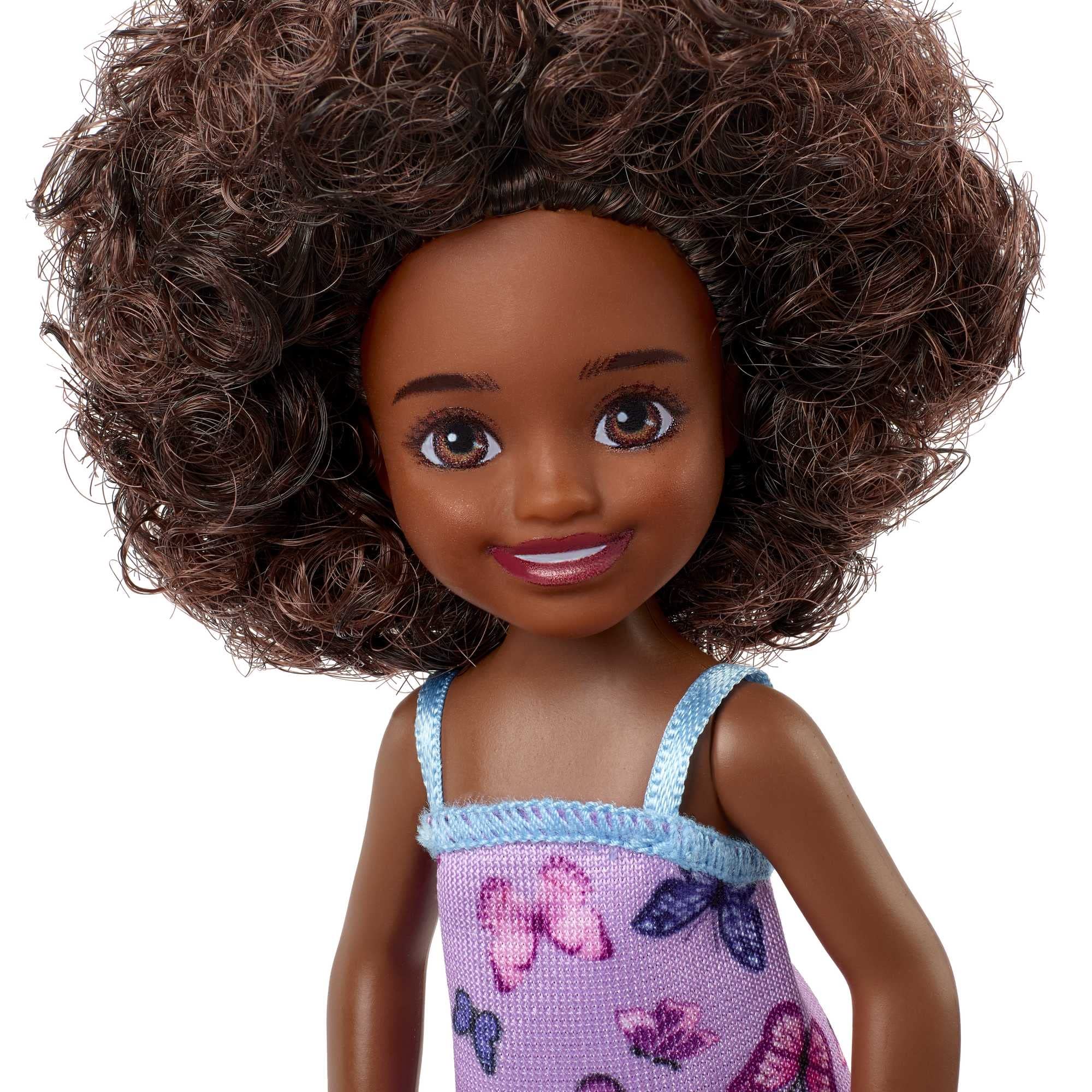 Barbie Chelsea doll headband accents curly hair for sweet everyday styling.
