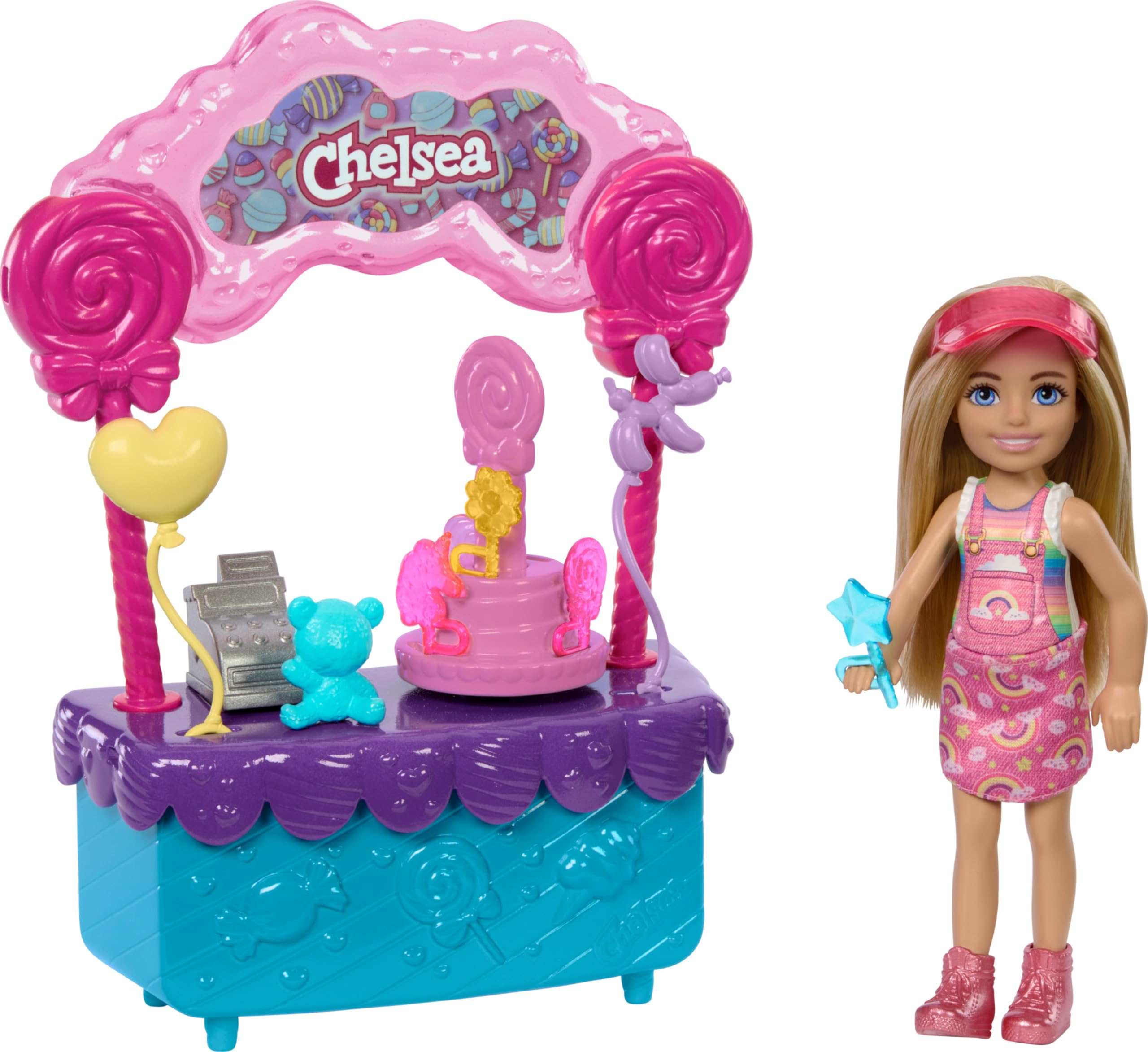 Barbie Chelsea doll beside the lollipop stand for imaginative candy shop play.
