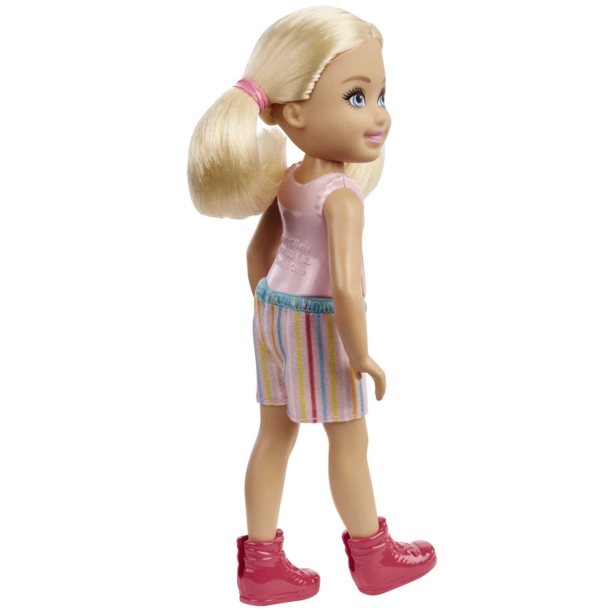 Barbie Chelsea doll wearing pink boots, easy to wear and remove during play.
