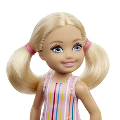Barbie Chelsea doll in striped dress with removable skirt for mix-and-match outfits.