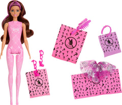 Barbie Color Reveal bow brush helps style and tidy the look.