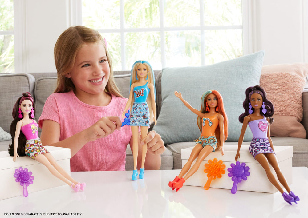 Barbie Color Reveal doll with pink coating, color-changing decal revealed by water.