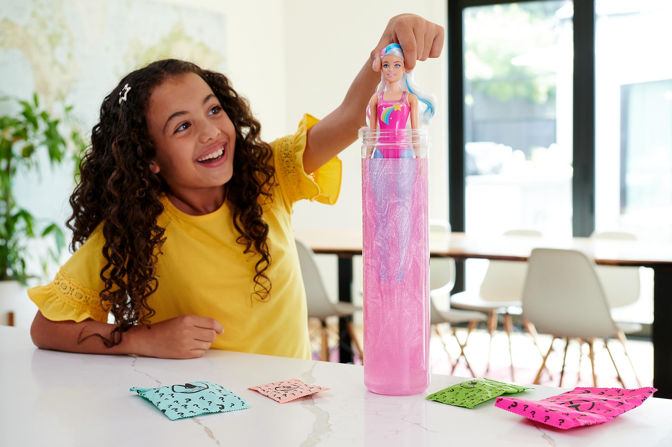 Barbie Color Reveal outfit includes holographic shorts for futuristic styling.