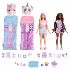 Barbie Cutie Reveal slumber party dolls emerge from sleeping bags for imaginative play.