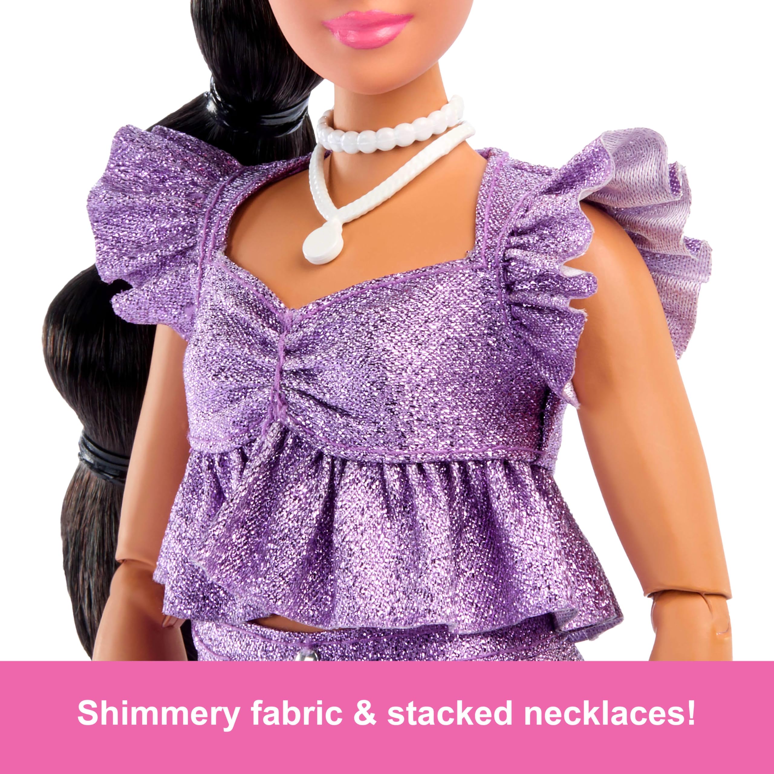 Barbie Deluxe Style Doll in amethyst outfit shimmers for stylish posing.