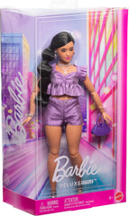 Barbie Deluxe Style Doll bendable joints enable dynamic poses and display.