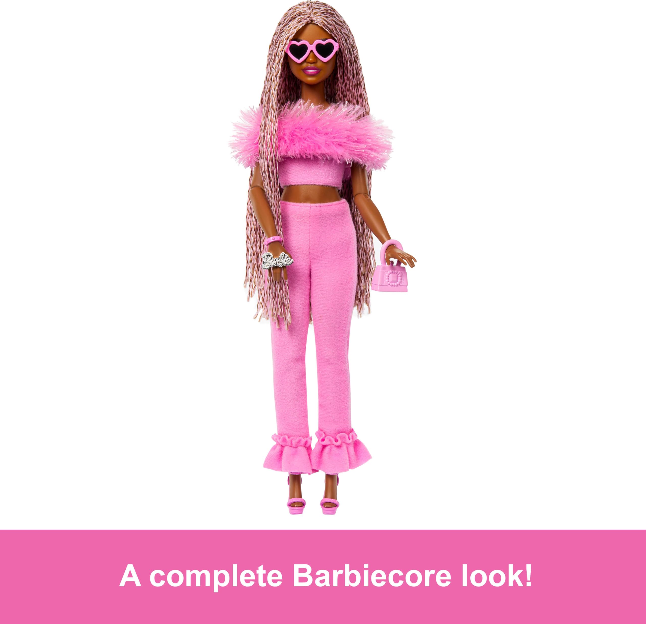 Barbie Deluxe Style doll with heart sunglasses and pink purse supports imaginative play.