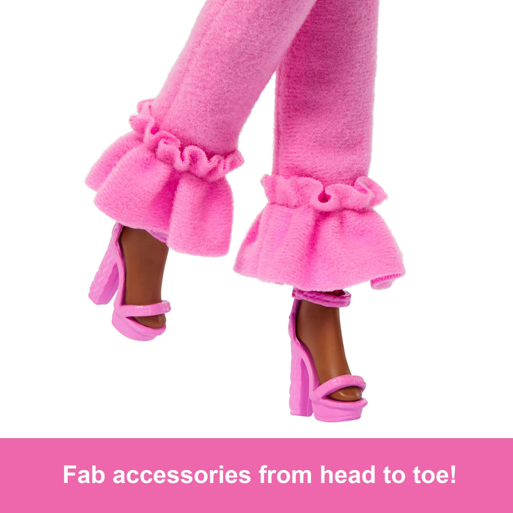 Barbie Deluxe Style doll's strappy heels inspire runway-ready poses.