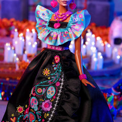 Barbie Dia de Muertos candy necklace and pink ring for playful accents.