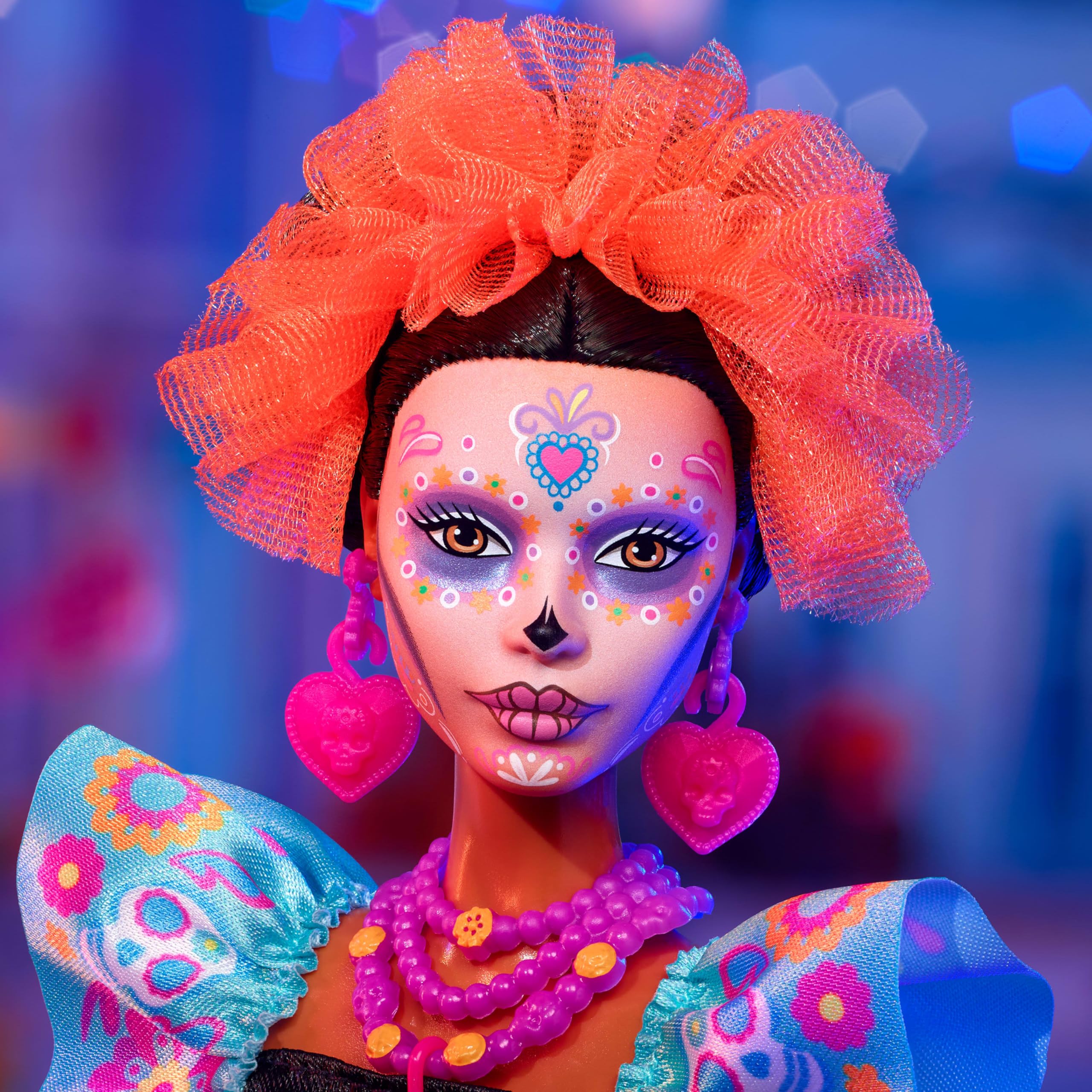 Barbie Dia de Muertos marigold headpiece enhances festive calavera look.