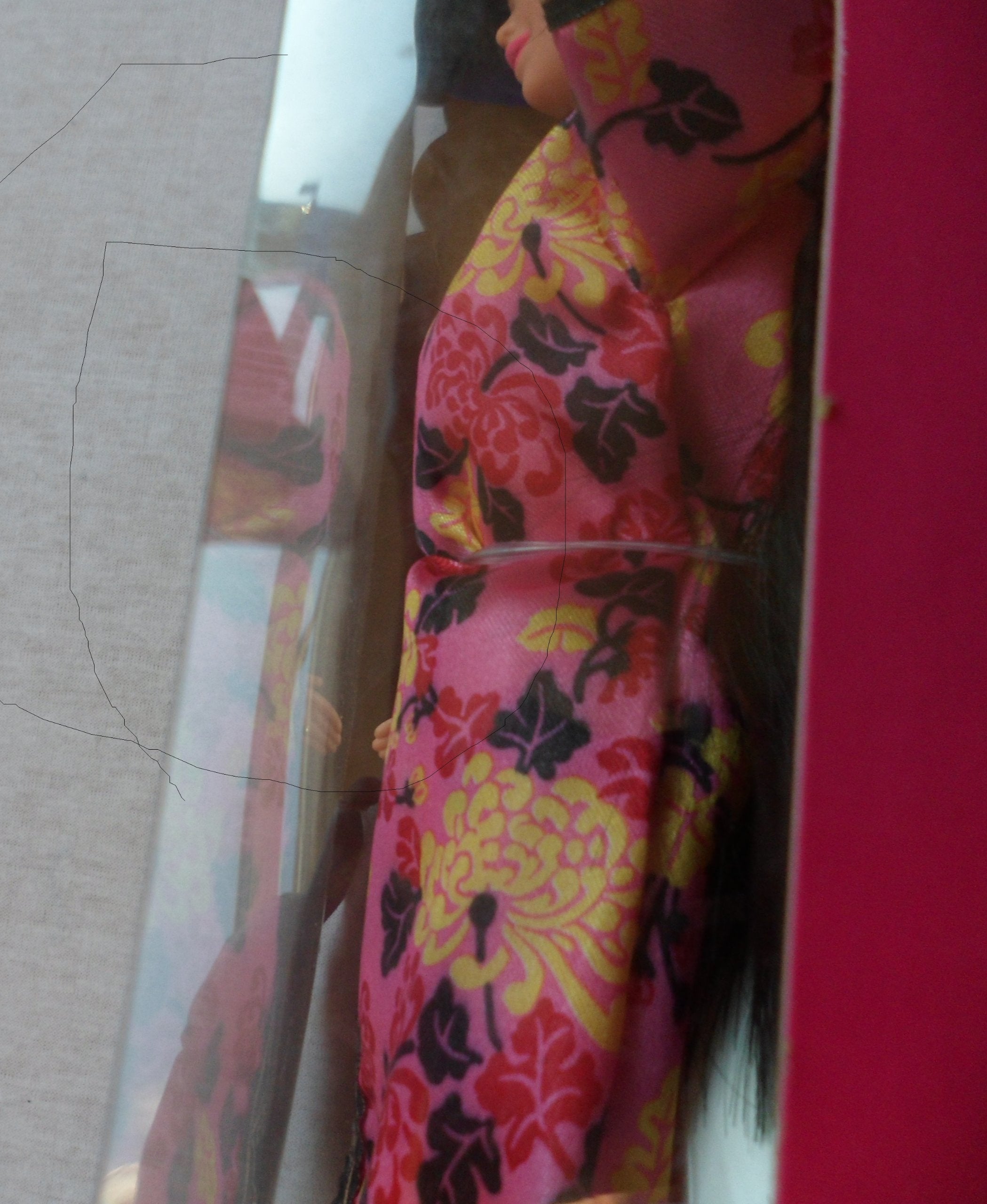 Dolls of the World collection featuring Barbie in Chinese-inspired costume.