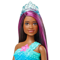 Barbie Dreamtopia pink-streaked hair enhances the fantasy mermaid look for imaginative storytelling.