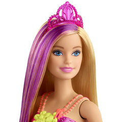 Barbie Dreamtopia purple hair streak enhances fantasy fashion looks.
