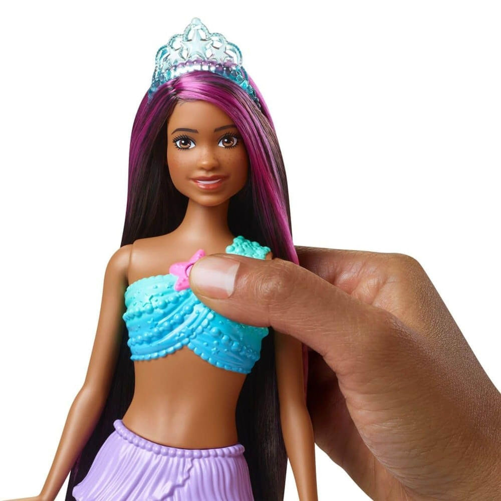 Barbie Dreamtopia rainbow fins and pearl-detailed bodice spark colorful pretend adventures.