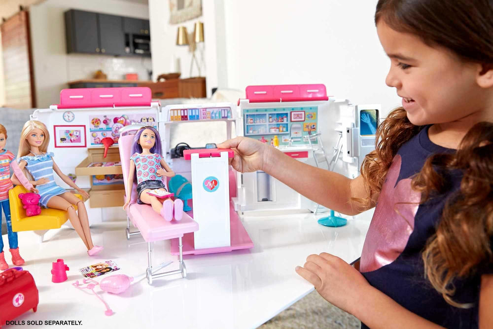 Barbie emergency vehicle lights up as a rescue tool for imaginative role-play