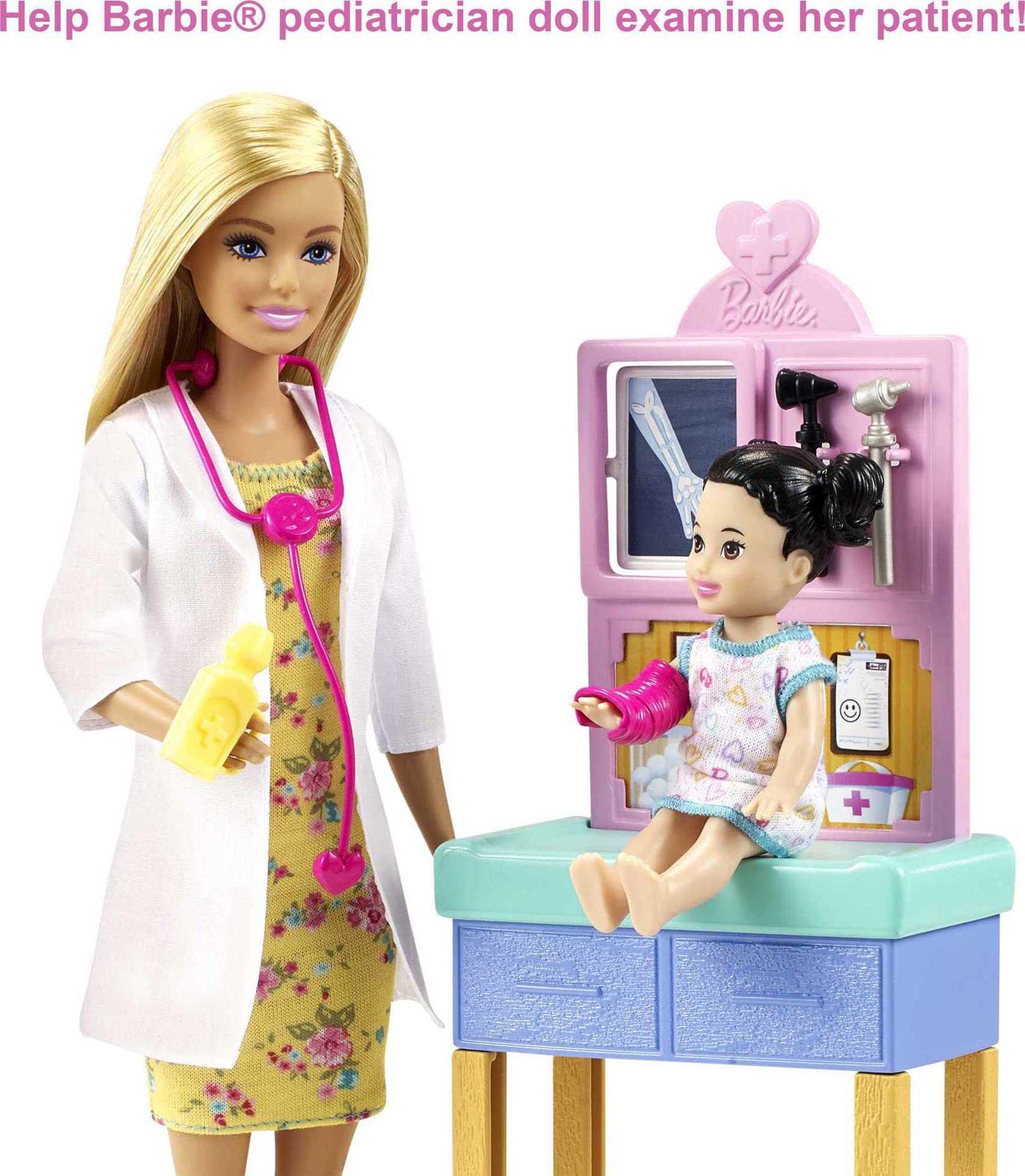 Barbie exam table with x-ray viewer for pretend patient checkups.