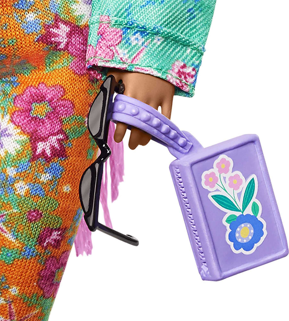 Barbie Extra DJ mouse pet with its own booth for party-style play.
