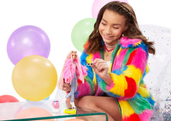 Barbie Extra doll wearing a fluffy pink coat for bold dress-up