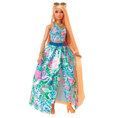 Barbie Extra Fancy doll front view highlighting orange hair and floral print for imaginative play
