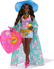 Barbie Extra Fly doll in beach swimsuit and tropical accessories for stylish storytelling adventures.