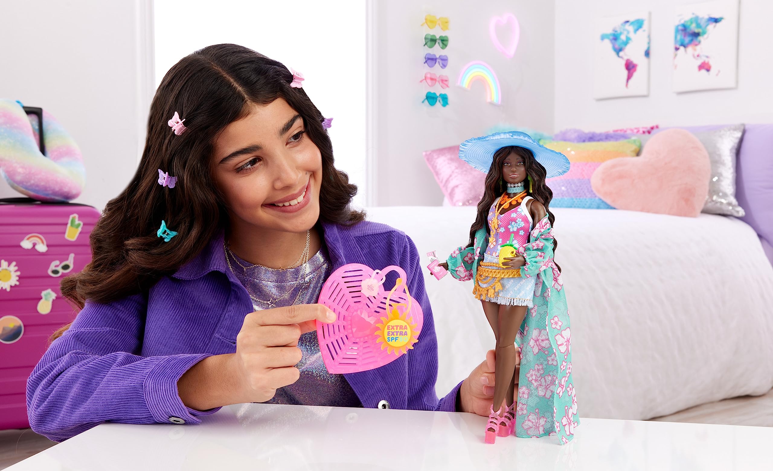 Barbie Extra Fly doll with denim skirt and tropical vibes for versatile travel play.