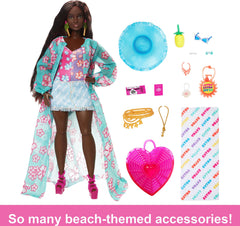 Barbie Extra Fly doll wearing tropical coverup for glamorous beach adventures and imaginative dressing.