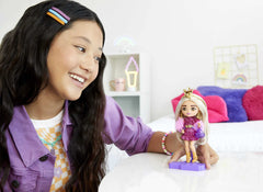 Barbie Extra Minis in sparkly red dress demonstrates bold fashion for on-the-go play.