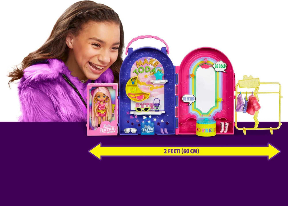 Exclusive Barbie Extra Minis doll in pink faux-fur coat inspires imaginative styling sessions.