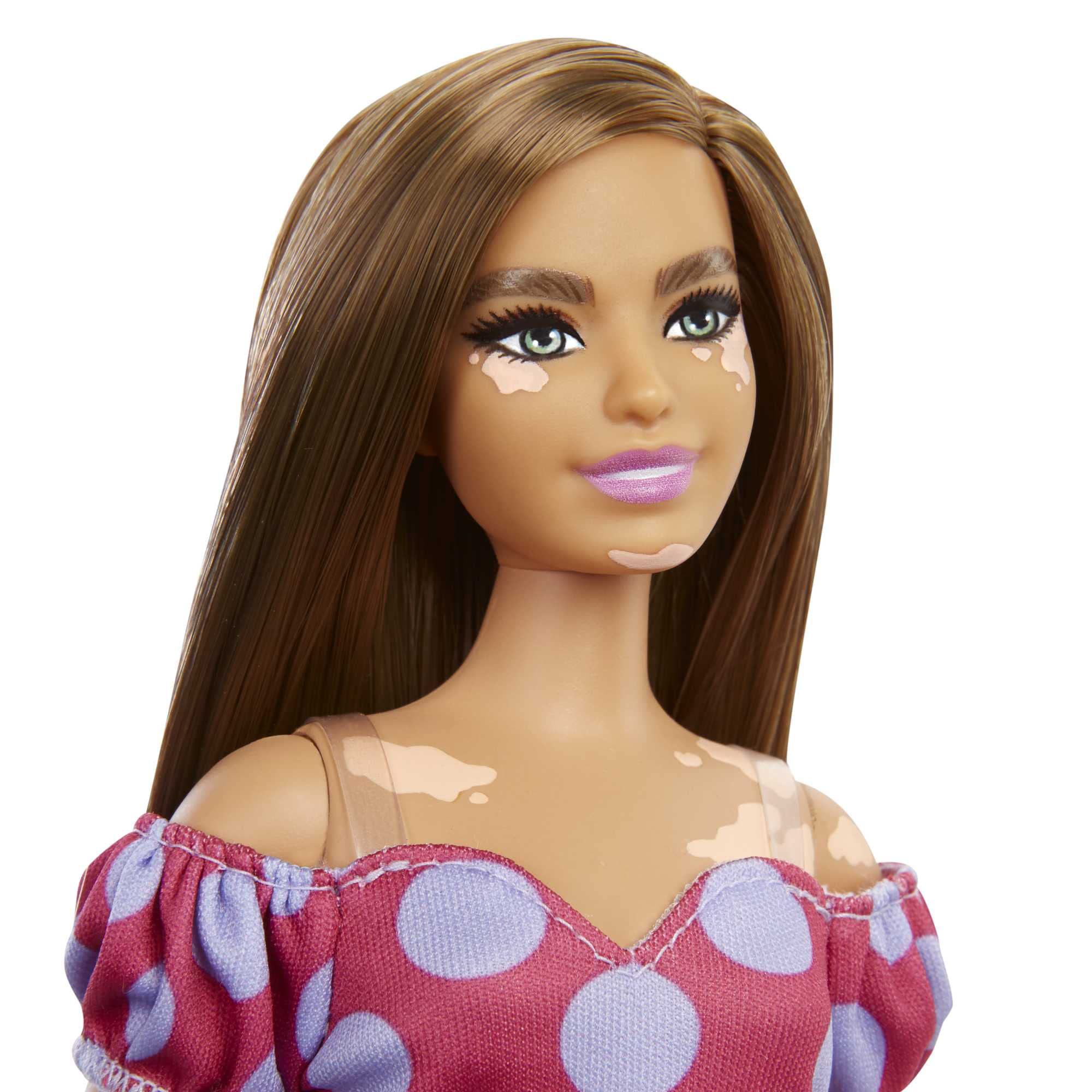 Barbie Fashionistas #171 long brunette hair frames a bold polka dot dress.